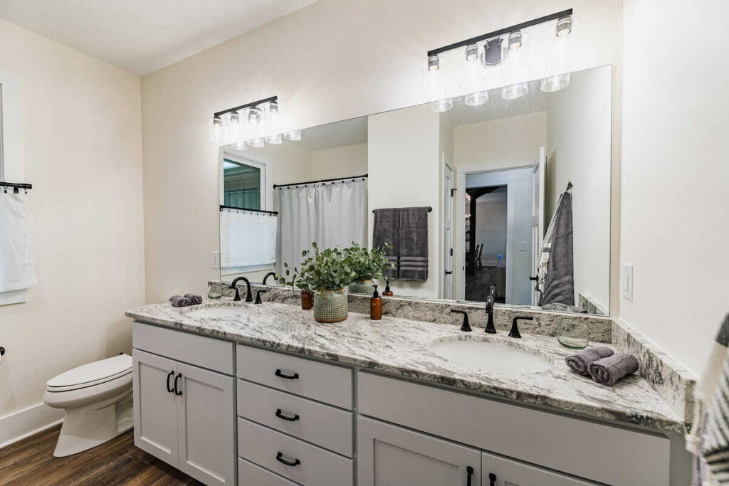 Double marble topped bathroom vanities.