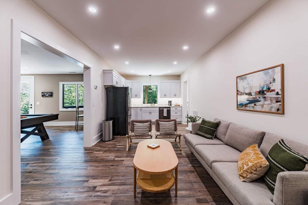 Kitchen and family room combination with a sofa and coffee table.