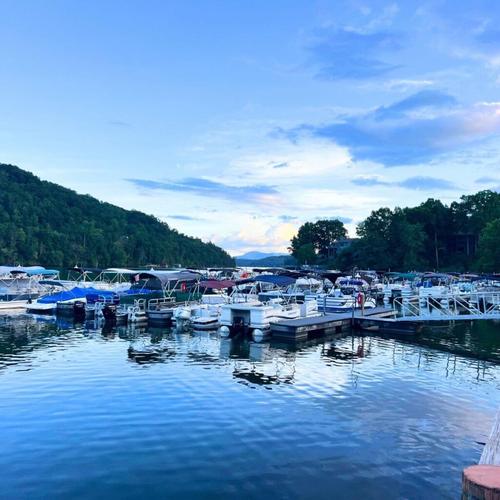 Twilight photo of boats in the marina at Rumbling Bald at Lake Lure.