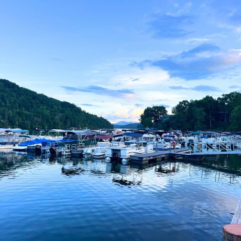 Twilight photo of boats in the marina at Rumbling Bald at Lake Lure.